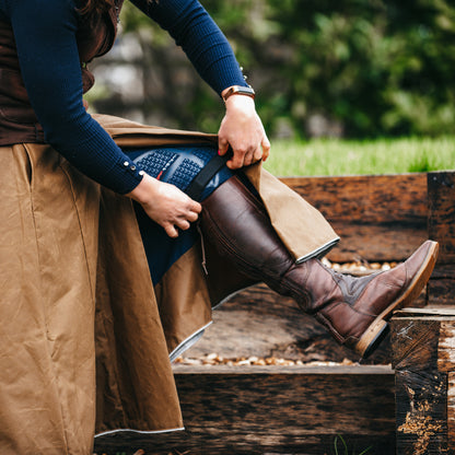 close up of a leg strap being altered in our waterproof hand crafted habits.